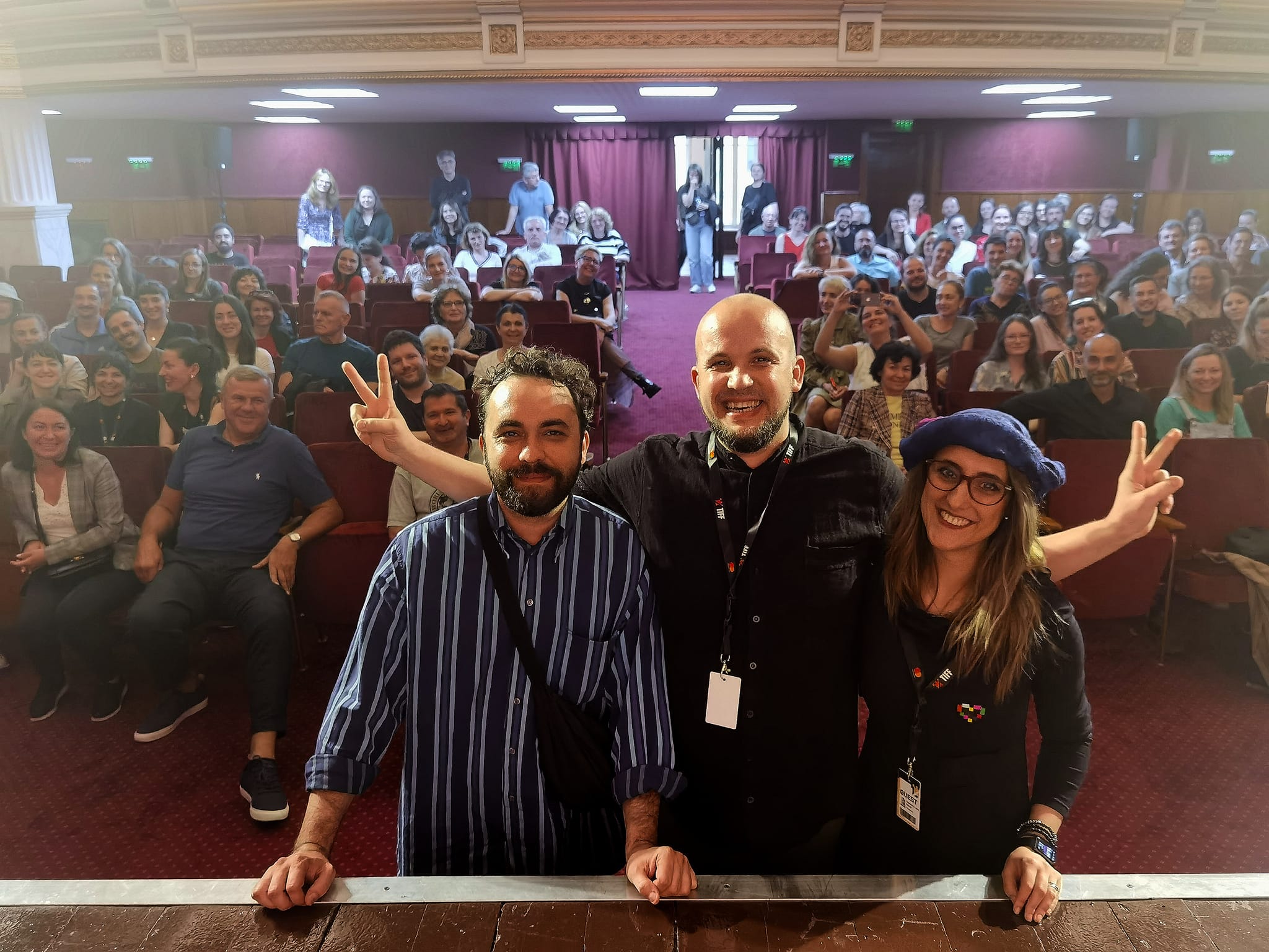 Daniel Bărnuți and Alexandra at a cinema screening with full audience — TIFF 2023